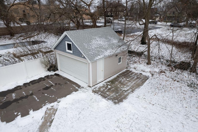 view of snow covered garage