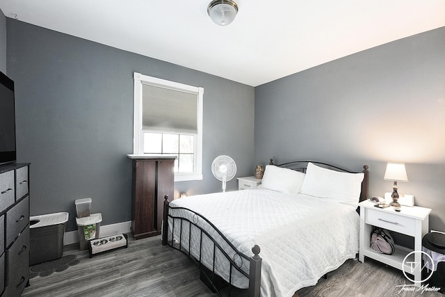 bedroom featuring dark wood-type flooring