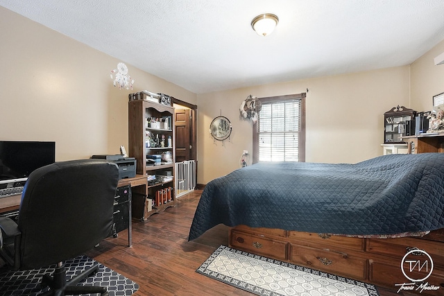 bedroom featuring dark wood-type flooring