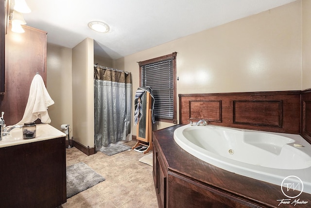 bathroom with tile patterned floors and independent shower and bath