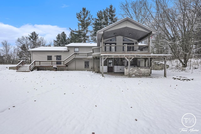 view of snow covered house