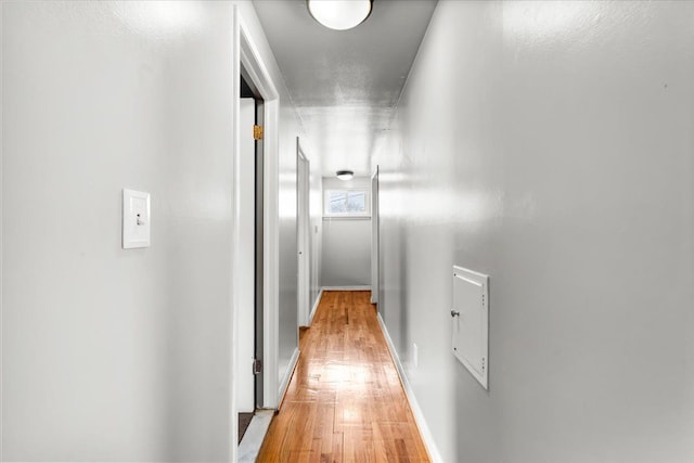 hall with light wood-type flooring