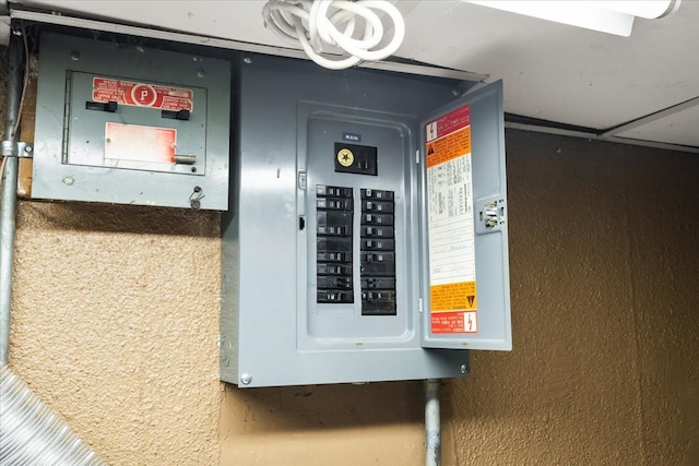 utility room featuring electric panel