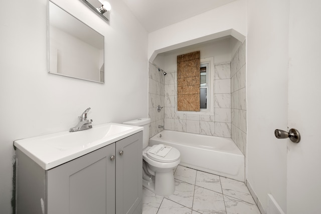 full bathroom with vanity, toilet, and tiled shower / bath