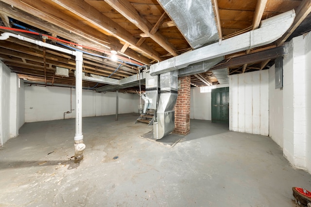 basement featuring heating unit