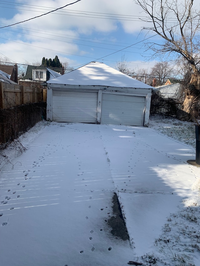 view of snow covered garage