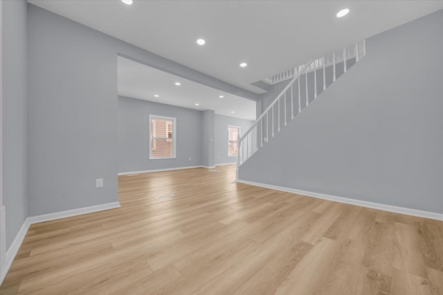 unfurnished living room with light hardwood / wood-style flooring