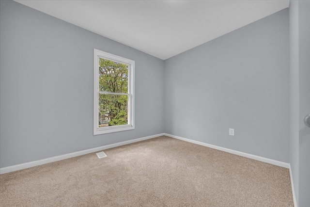 view of carpeted spare room