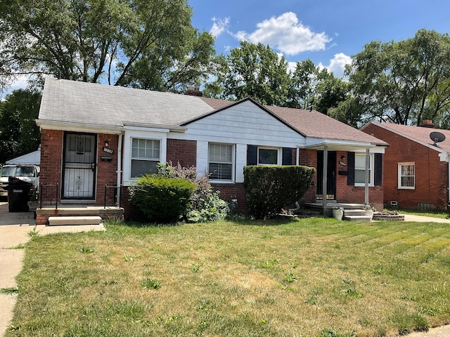 view of front facade with a front yard