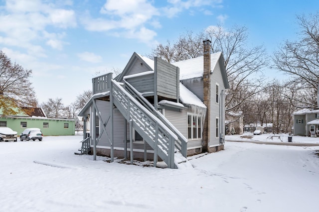 view of snow covered property