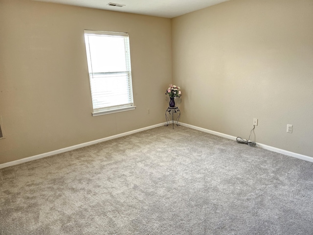 unfurnished room featuring carpet flooring