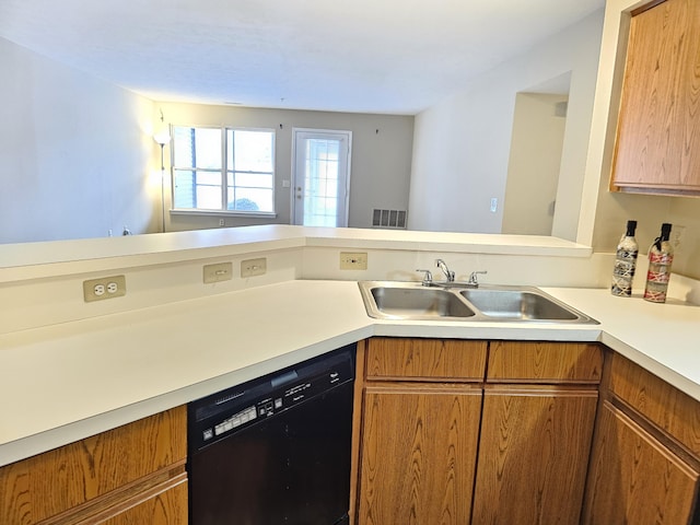 kitchen featuring dishwasher and sink