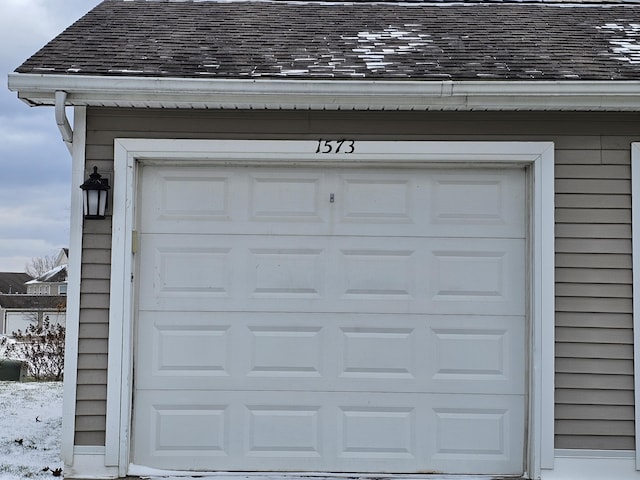 view of snow covered garage