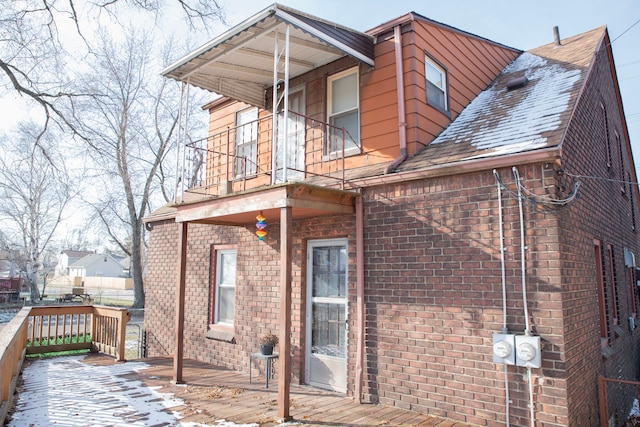 rear view of house with a balcony