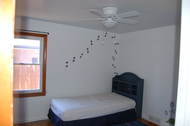 bedroom with visible vents and ceiling fan