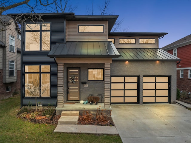 modern home featuring a garage