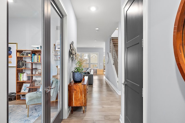 hall featuring light hardwood / wood-style floors