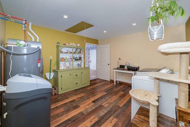 2565 S M 30th Rd, Beaverton, MI 48612 - kitchen featuring green cabinets, water heater, dark wood-style flooring, recessed lighting, and separate washer and dryer