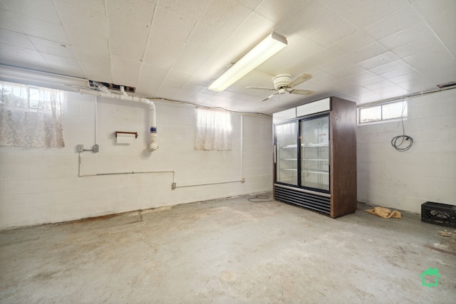 basement with ceiling fan