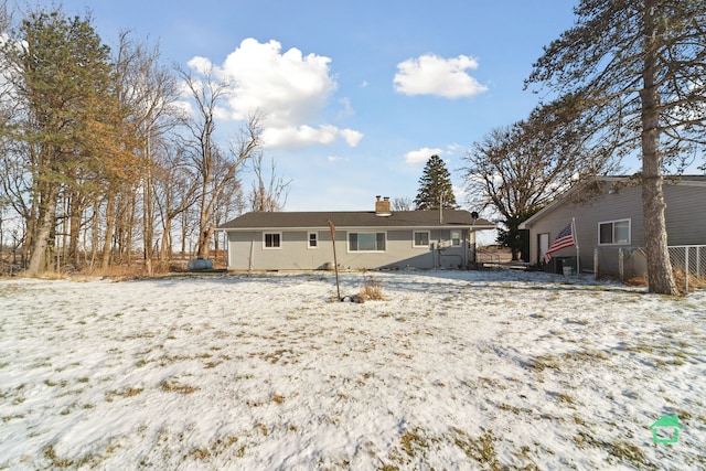 view of snow covered property