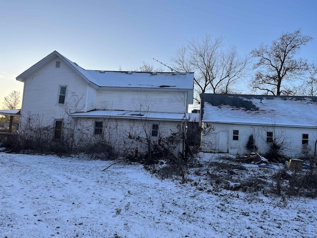 view of snow covered house