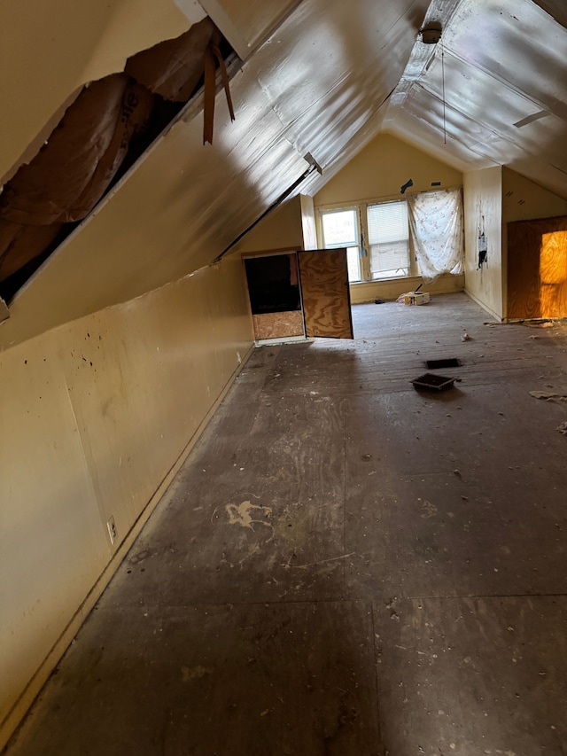 bonus room with vaulted ceiling