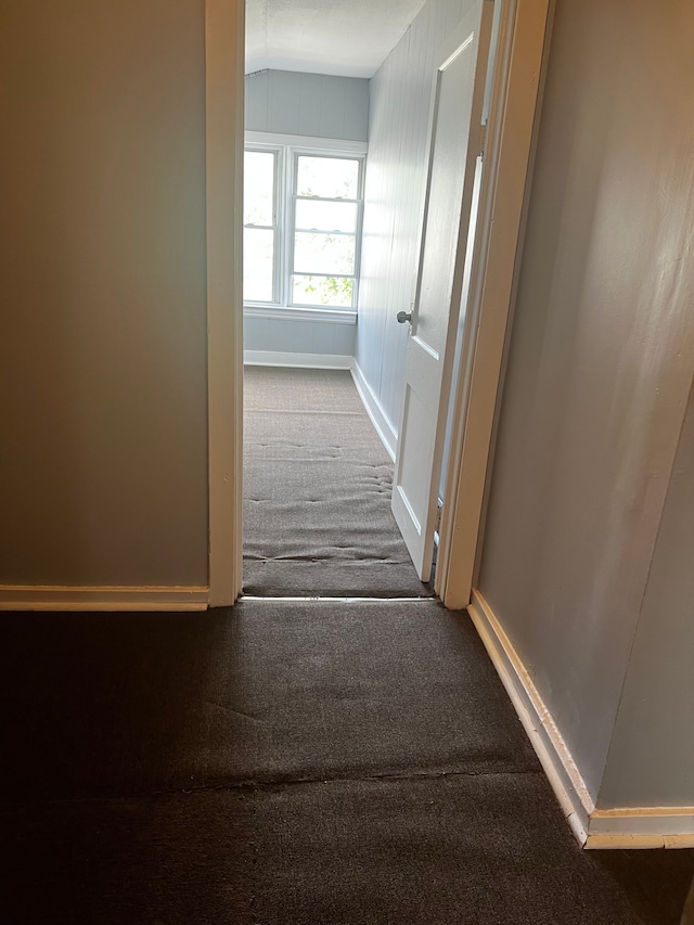 hallway with carpet