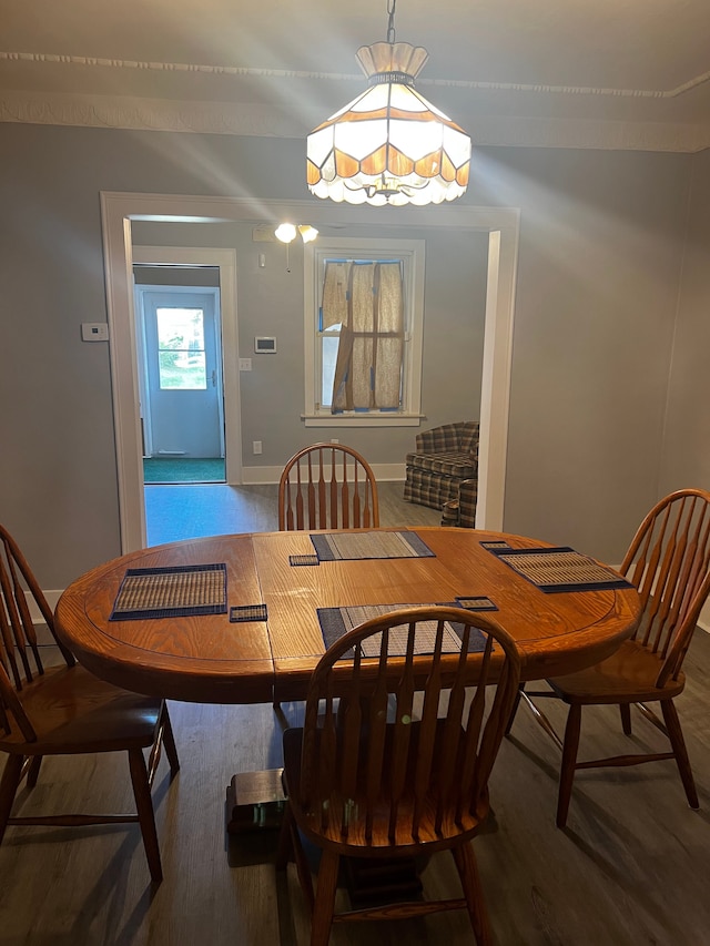 dining area with wood-type flooring