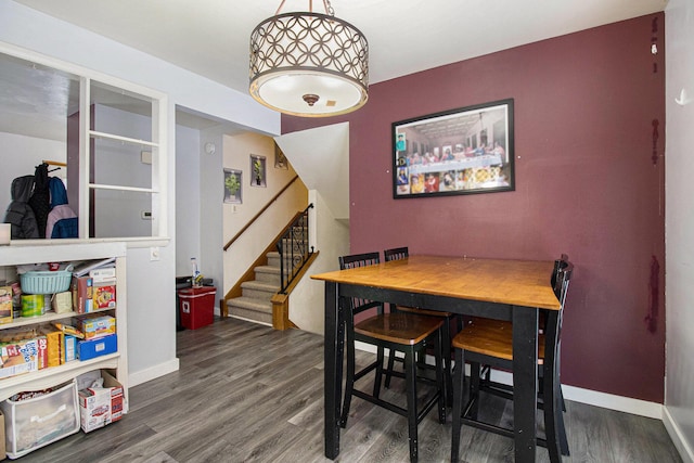 dining space featuring hardwood / wood-style floors