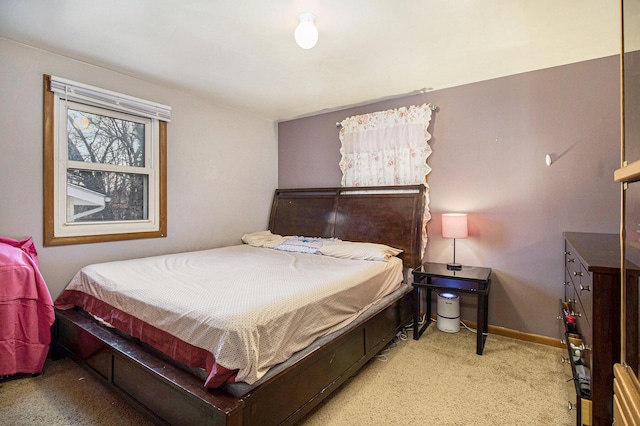 bedroom with light colored carpet