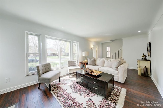 13966 Warwick St, Detroit, MI 48223 - living room featuring dark wood-style flooring, stairway, and recessed lighting