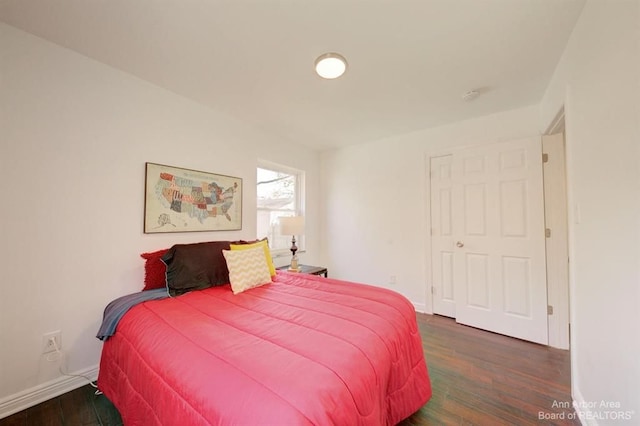 13966 Warwick St, Detroit, MI 48223 - bedroom featuring wood finished floors and baseboards