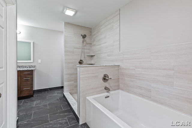 bathroom featuring vanity and shower with separate bathtub