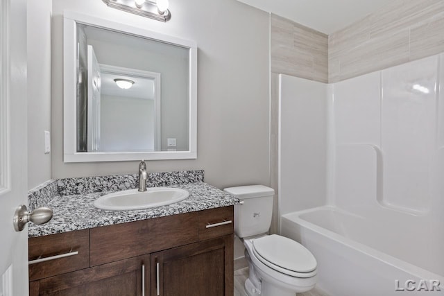 full bathroom with shower / bathtub combination, toilet, and vanity