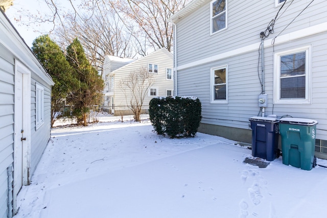 view of yard covered in snow