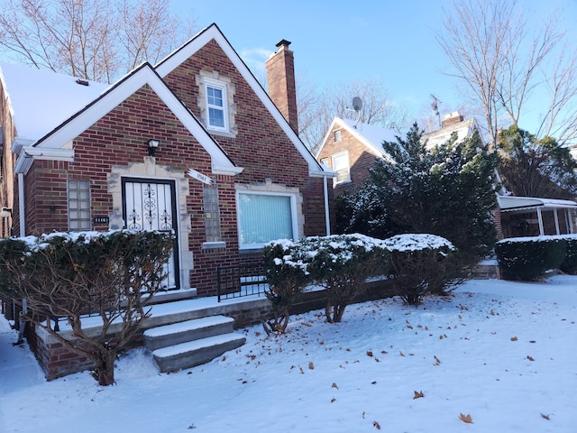 view of front of property featuring brick siding