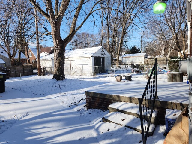 view of yard covered in snow