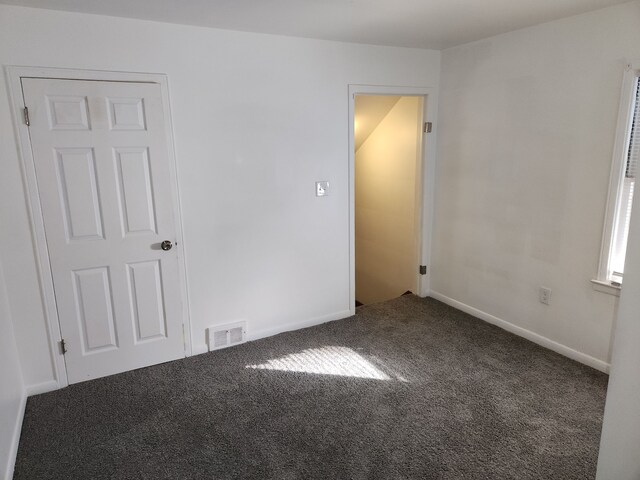 empty room featuring carpet