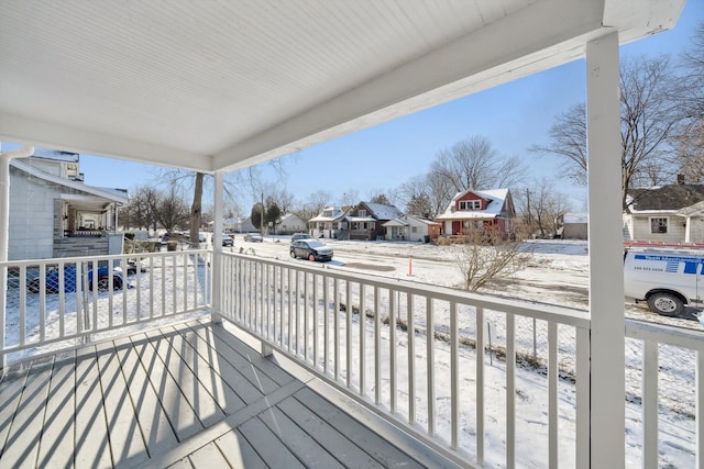 view of snow covered deck