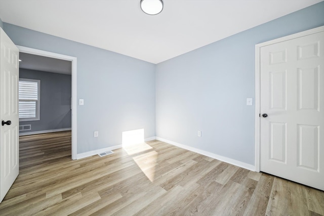 unfurnished bedroom with light hardwood / wood-style floors