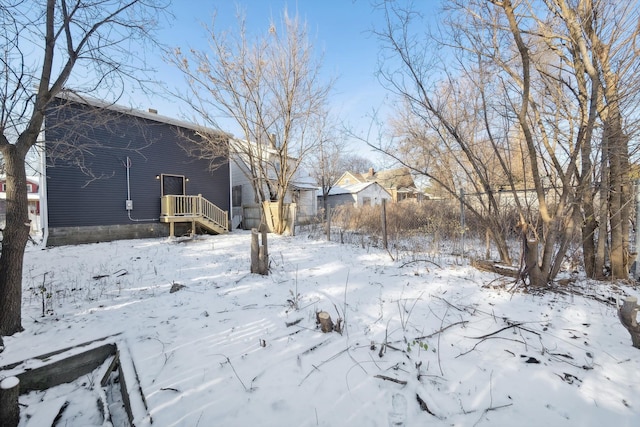 view of yard covered in snow