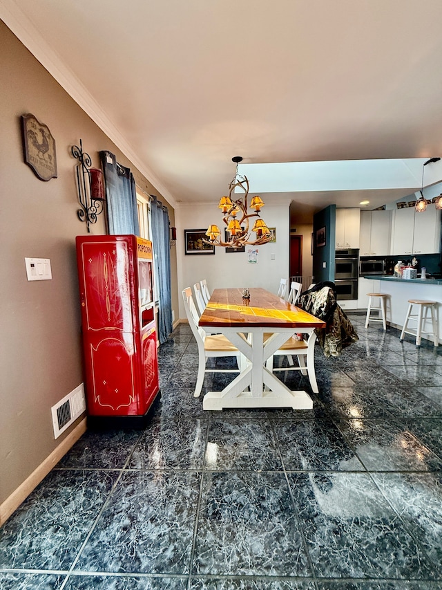 dining space featuring crown molding, marble finish floor, visible vents, and baseboards