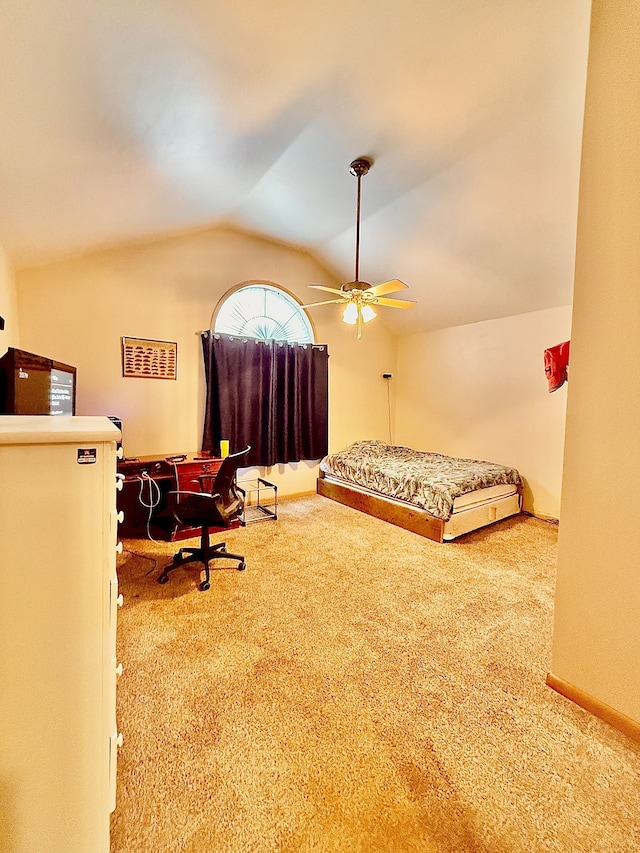 bedroom featuring ceiling fan, carpet flooring, and vaulted ceiling