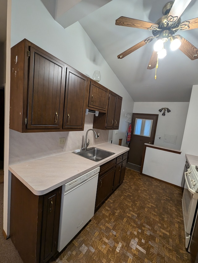 kitchen featuring lofted ceiling, white dishwasher, sink, ceiling fan, and stainless steel range oven