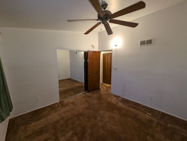 interior space featuring ceiling fan and lofted ceiling