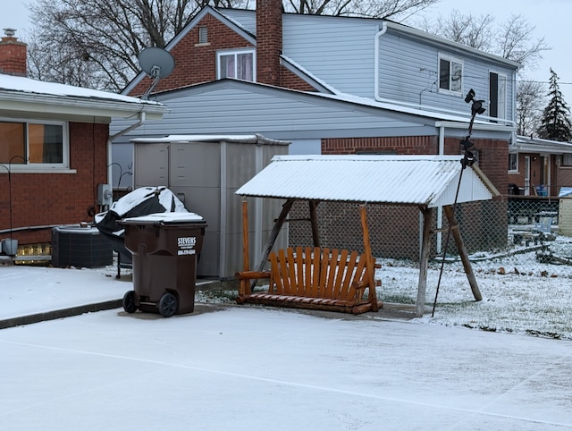 exterior space featuring central AC unit