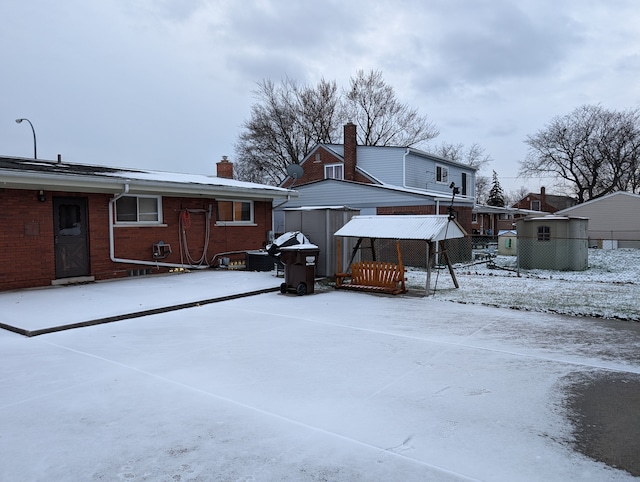 view of snow covered property