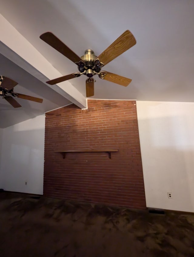 interior details with carpet, ceiling fan, and beam ceiling