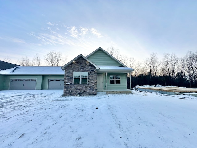 view of front of home with a garage