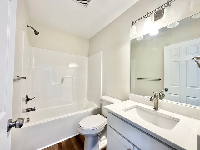 bathroom featuring shower / bathtub combination, toilet, wood finished floors, vanity, and visible vents